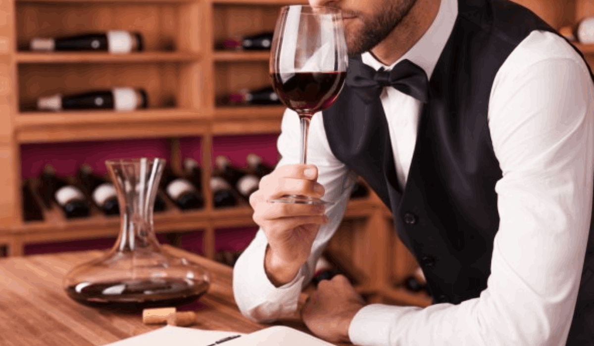 fine wine specialist from bordeux sniffing wine